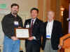 Thurs-GenMtg-Award-SAntosz-ChairPCSC.jpg (136346 bytes)